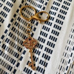 A great Stocking Stuffer!
Elegant Gold and Pink Bag Charm Keychain